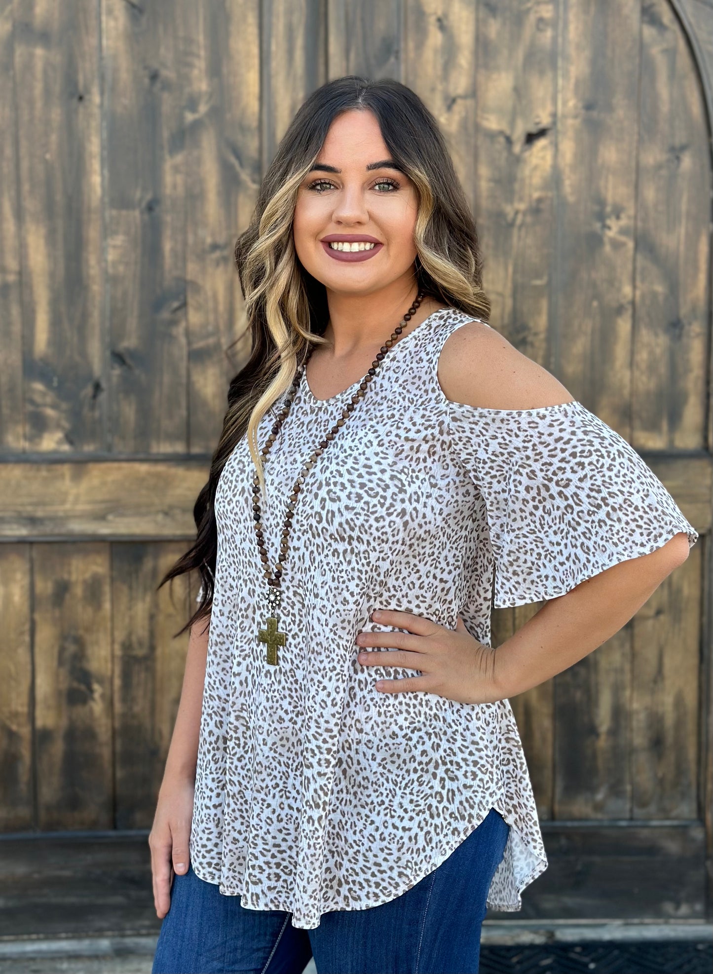Taupe leopard print cold shoulder tunic