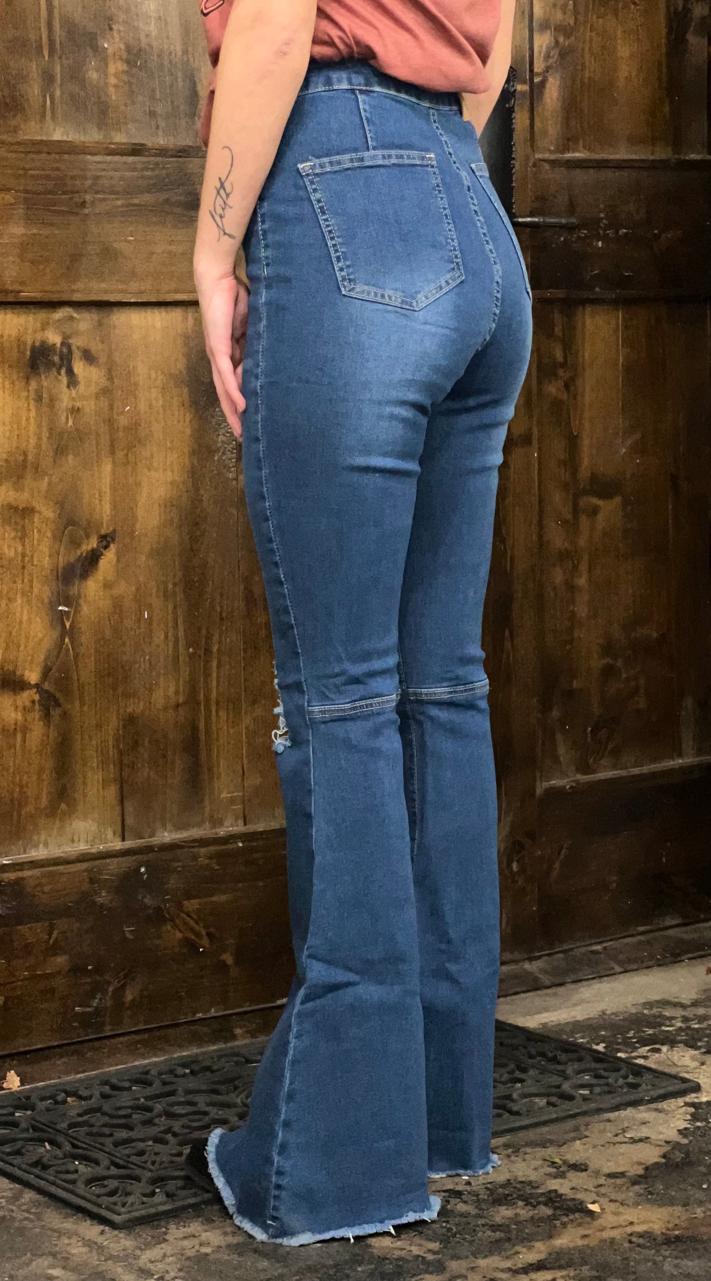 Medium denim distressed flare jeans