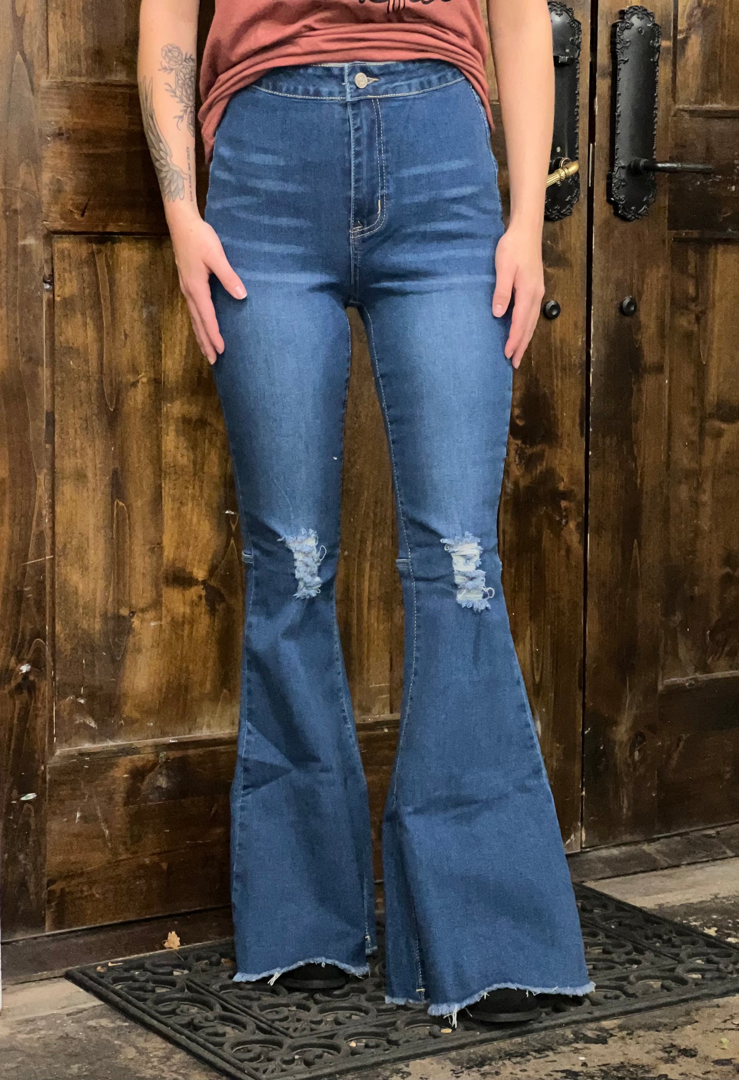 Medium denim distressed flare jeans