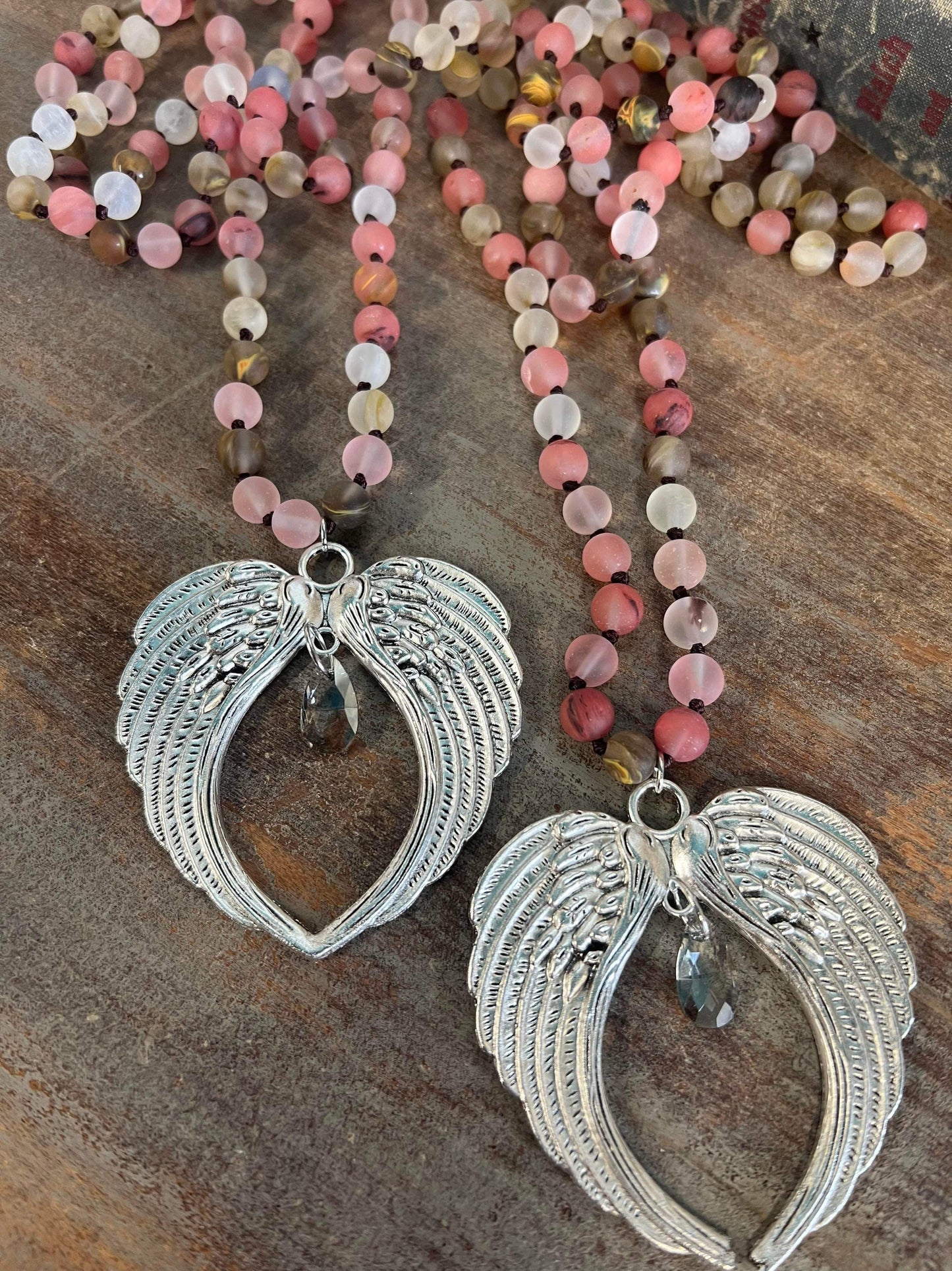 Natural stone bead with Angel wings pendant